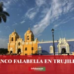 imágen de la catedral de trujillo con las letras banco falabella de color blanco y el logo de la web