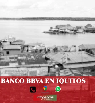 imágen de un pueblo a orillas de un río en iquitos con la palabra bbva, iconos de contacto y el logo de la web