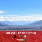 imágen panorámica de la ciudad de huancayo en fondo desenfocado con la palabra mibanco, iconos de contacto y el logo de la web